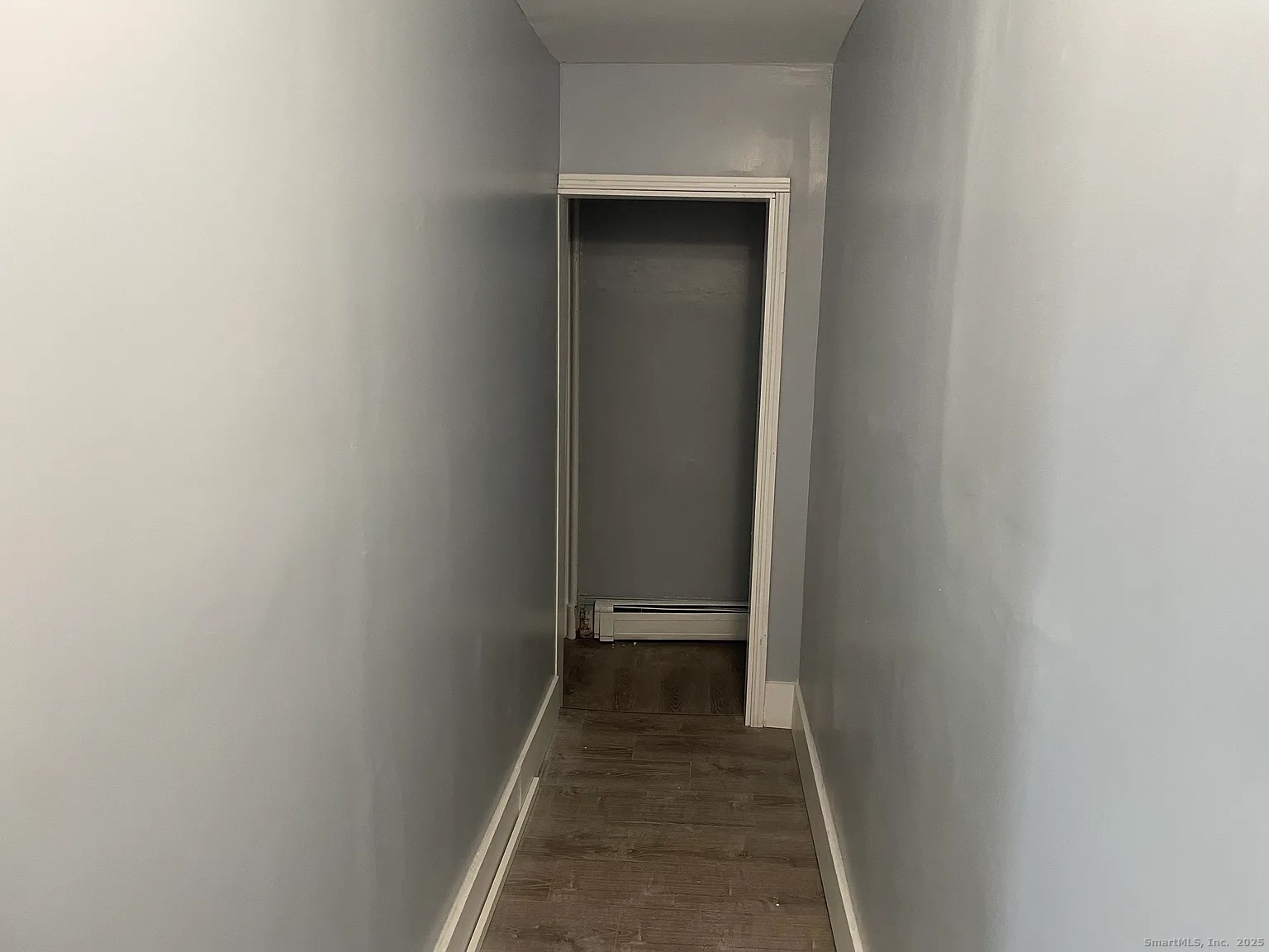 34 Park Street, Unit 1 Bridgeport, CT 06608 - Photo 4 of 8 a view of a hallway with wooden floor