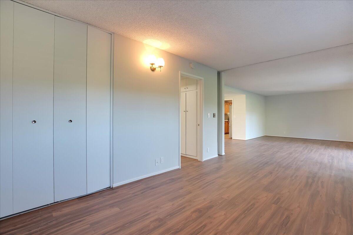 5910 Encina Road, Unit 3 Goleta, CA 93117 - Photo 21 of 45 a view of a room with wooden floor