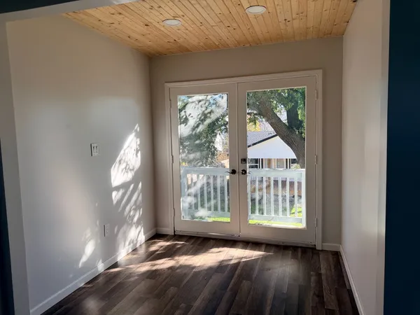 a view of a large window with a yard