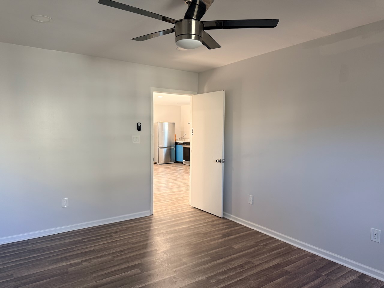3512 Castor Street Houston, TX 77022 - Photo 9 of 24 a view of a hallway with wooden floor