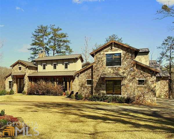 5291 Arkwright Road Macon, GA 31210 - Photo 1 of 24 a view of a house with a swimming pool