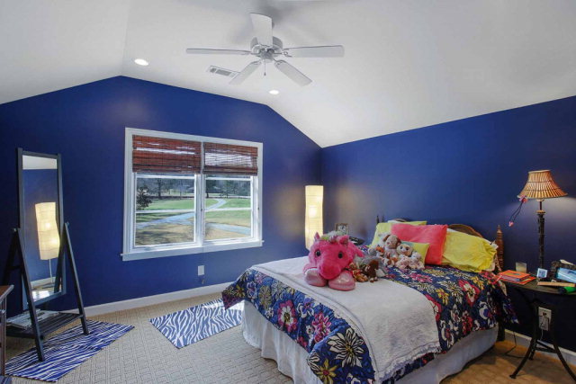 5291 Arkwright Road Macon, GA 31210 - Photo 17 of 24 a bedroom with a bed dresser and a window