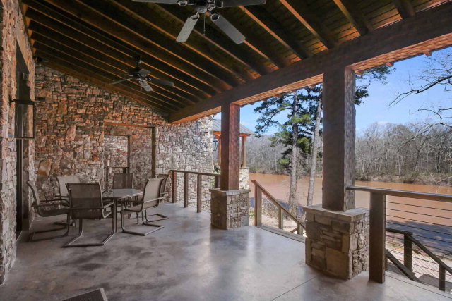 5291 Arkwright Road Macon, GA 31210 - Photo 21 of 24 a view of a patio with a table chairs and a couple of chairs