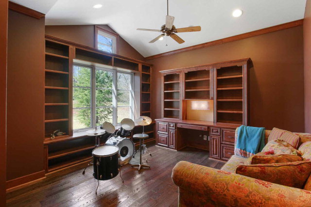 5291 Arkwright Road Macon, GA 31210 - Photo 4 of 24 a living room with furniture and a large window