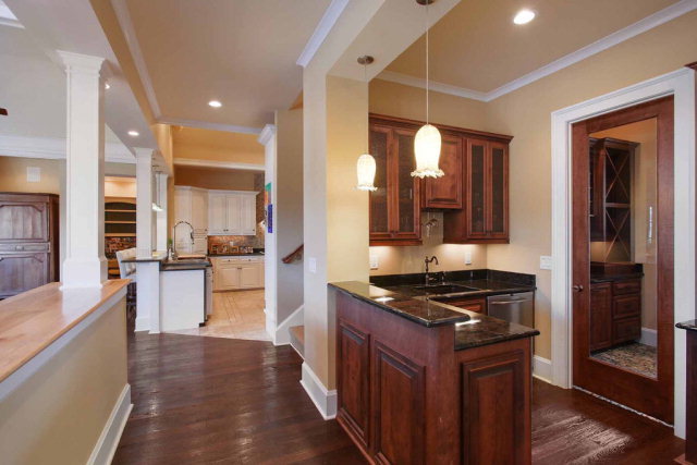 5291 Arkwright Road Macon, GA 31210 - Photo 6 of 24 a kitchen with stainless steel appliances granite countertop a stove and a refrigerator