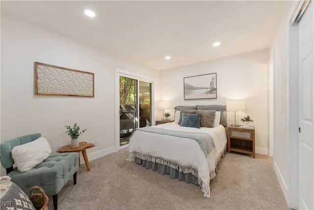 a bedroom with a bed and furniture