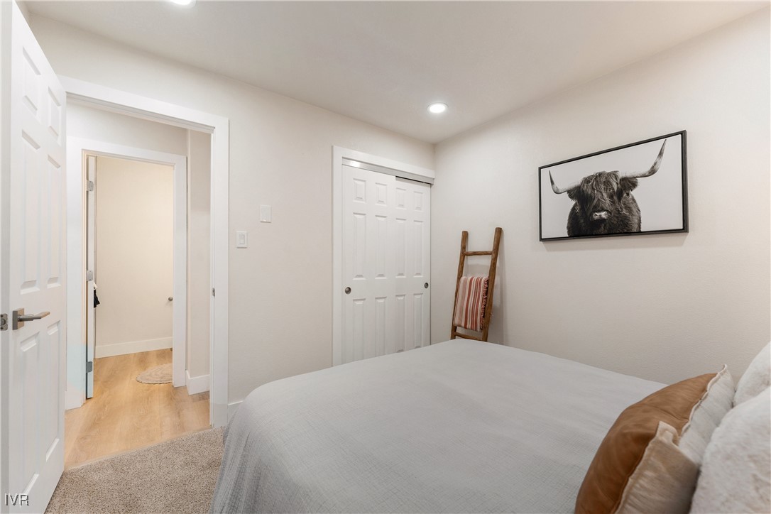 321 Ski Way, Unit 16 Incline Village, NV 89451 - Photo 16 of 23 a bedroom with a bed and wall painting