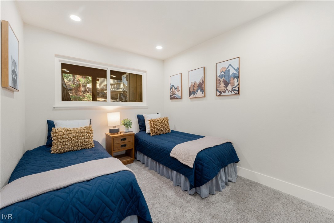 321 Ski Way, Unit 16 Incline Village, NV 89451 - Photo 18 of 23 a bedroom with two beds and painting on the wall