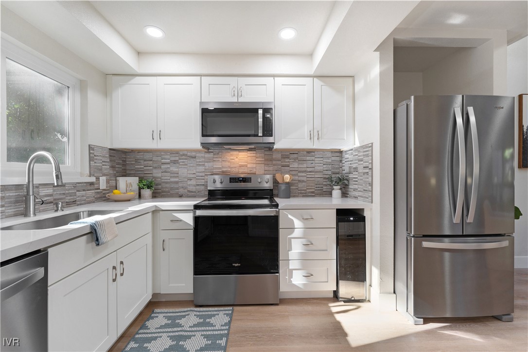 321 Ski Way, Unit 16 Incline Village, NV 89451 - Photo 7 of 23 a kitchen with a refrigerator sink and microwave