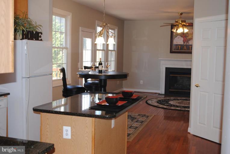 47659 Rhyolite Place Sterling, VA 20165 - Photo 8 of 25 Looking into kitchen from dining room.