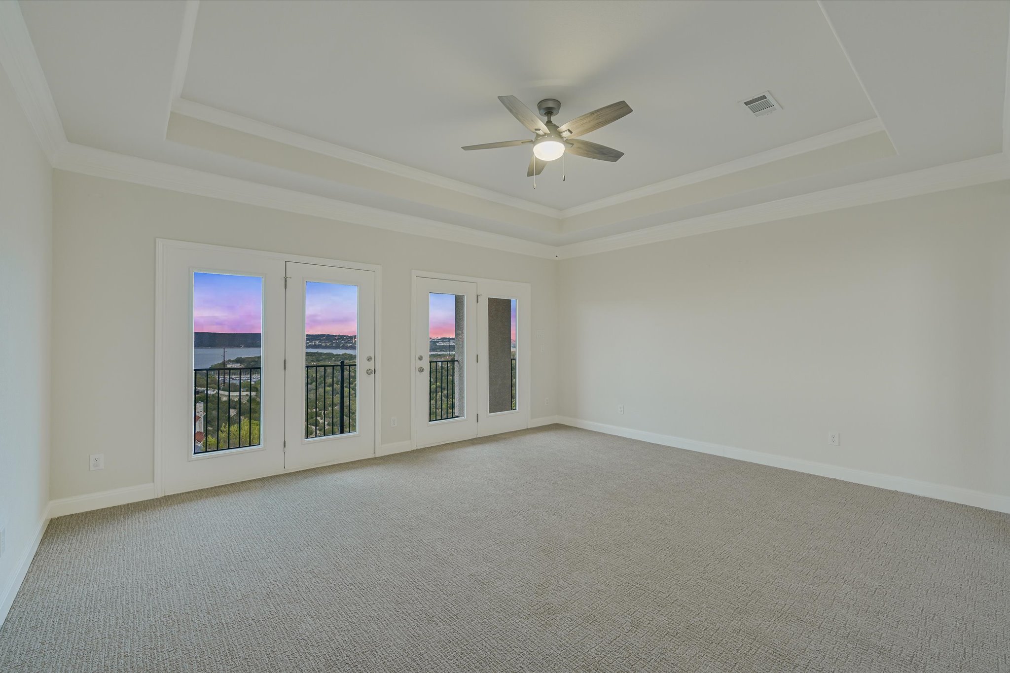4319 Rum Runner Road Austin, TX 78734 - Photo 20 of 40 Carpeted spare room featuring ceiling fan and baseboards