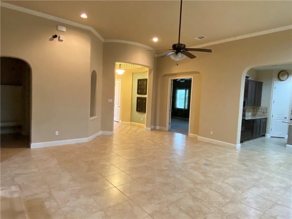 3216 Herradura Drive Cedar Park, TX 78641 - Photo 3 of 35 wooden floor in an empty room with a window
