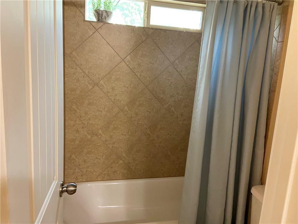 3216 Herradura Drive Cedar Park, TX 78641 - Photo 34 of 35 a bathroom with a bathtub