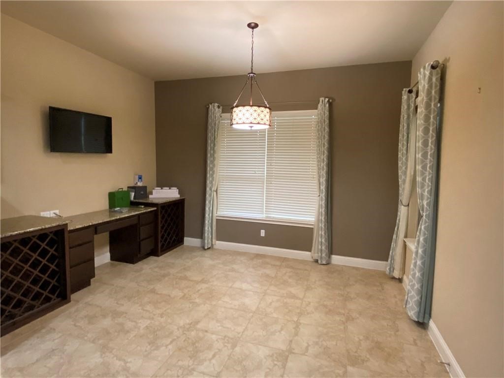 3216 Herradura Drive Cedar Park, TX 78641 - Photo 5 of 35 a view of a room with furniture and a window