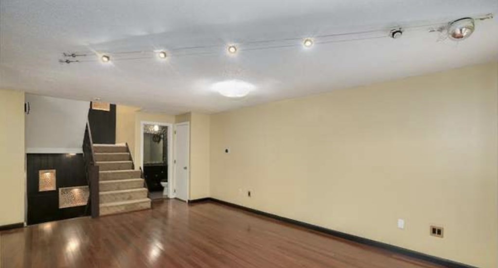 87 Meeting House Path, Unit 87 Ashland, MA 01721 - Photo 12 of 27 a view of a hallway with wooden floor