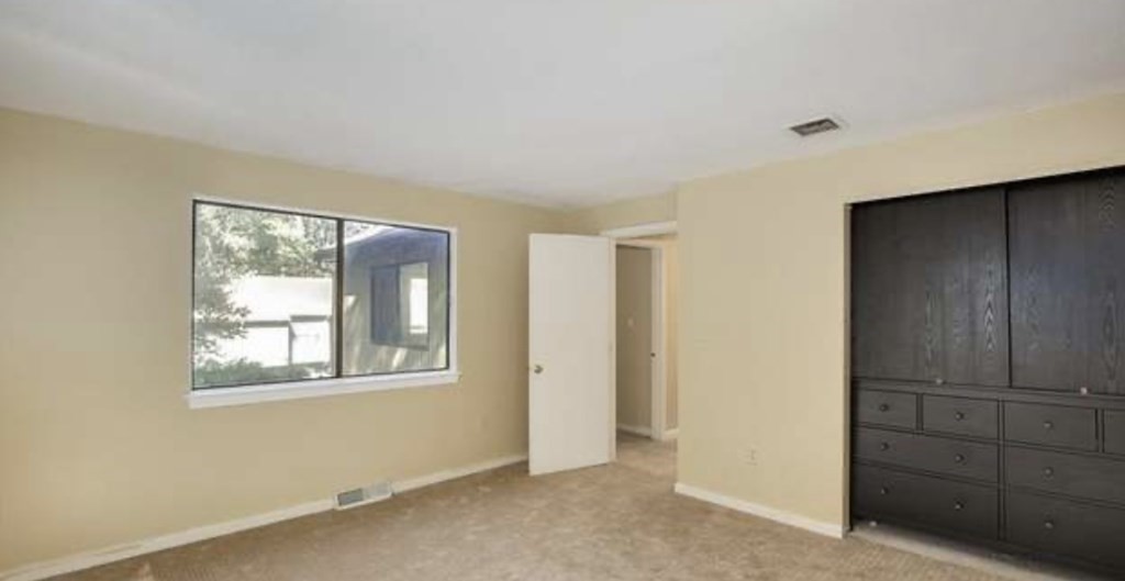 87 Meeting House Path, Unit 87 Ashland, MA 01721 - Photo 14 of 27 a view of an empty room with a window