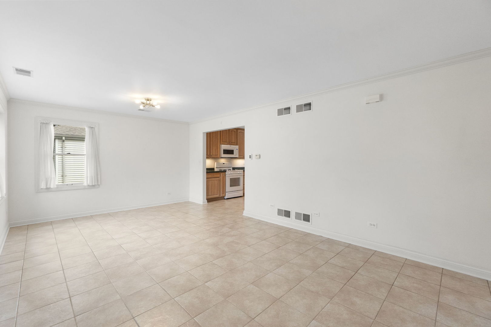 837 East Rockland Road Libertyville, IL 60048 - Photo 13 of 17 an empty room with shelves