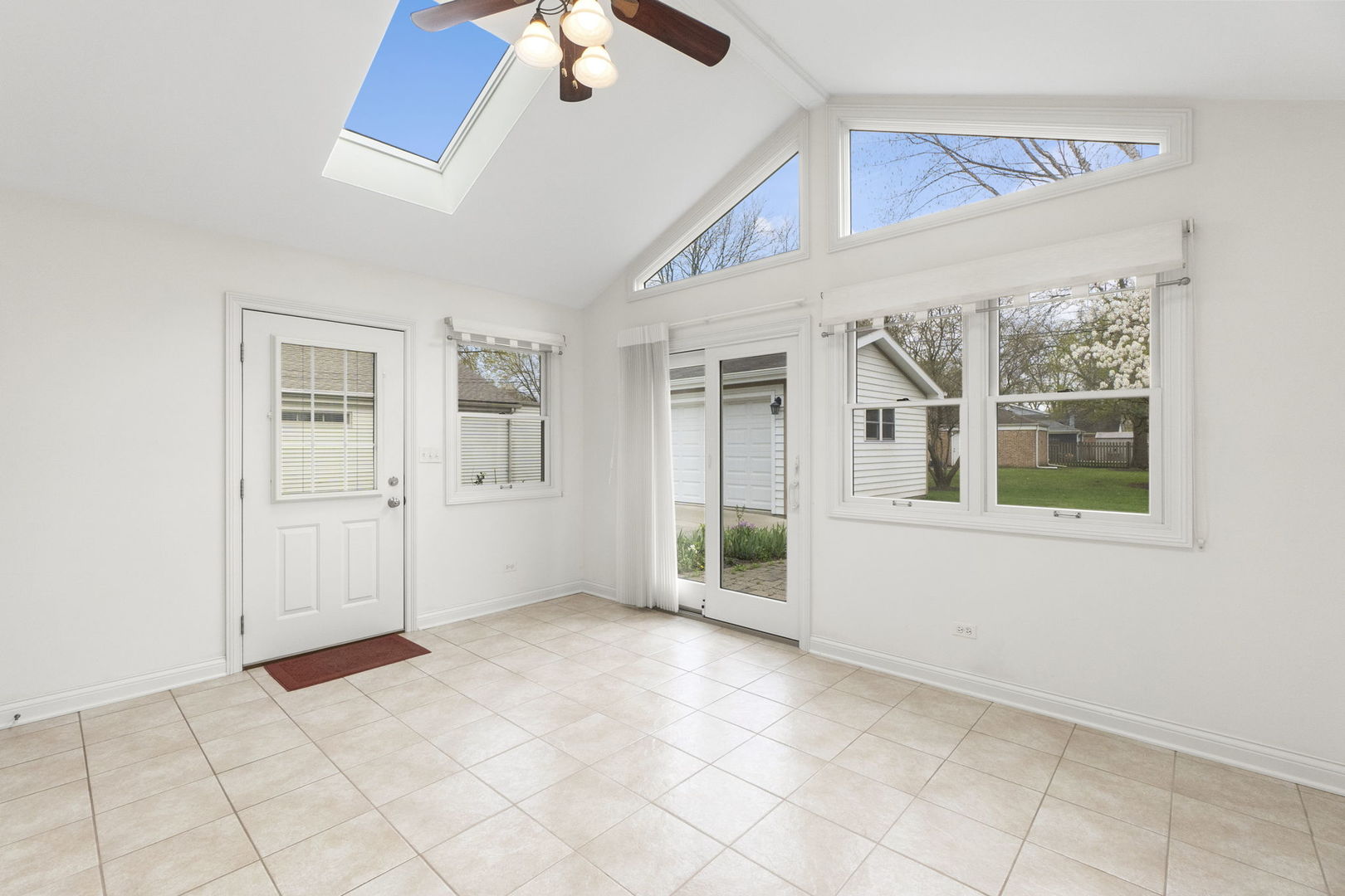 837 East Rockland Road Libertyville, IL 60048 - Photo 4 of 17 en empty room with windows