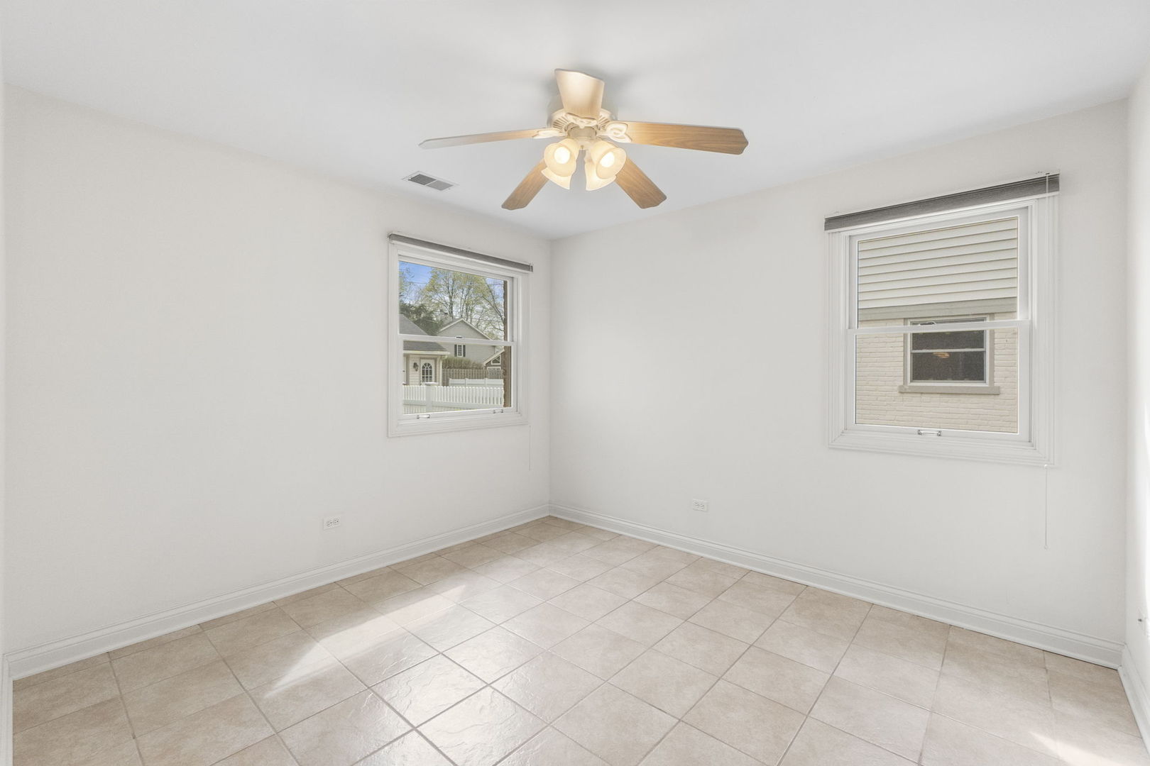 837 East Rockland Road Libertyville, IL 60048 - Photo 8 of 17 an empty room with a window
