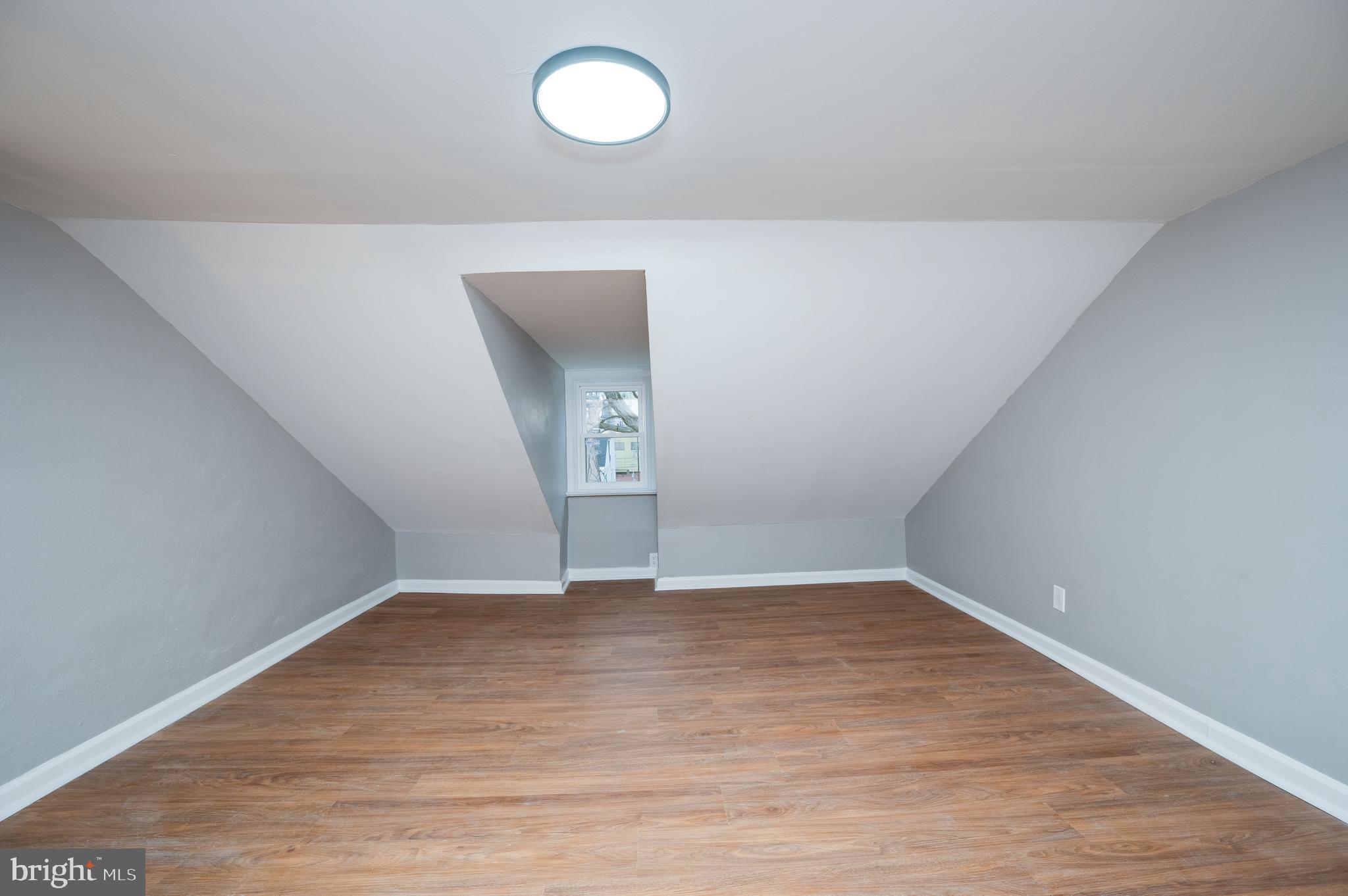 620 Minor Street Reading, PA 19602 - Photo 31 of 36 a view of an empty room with wooden floor
