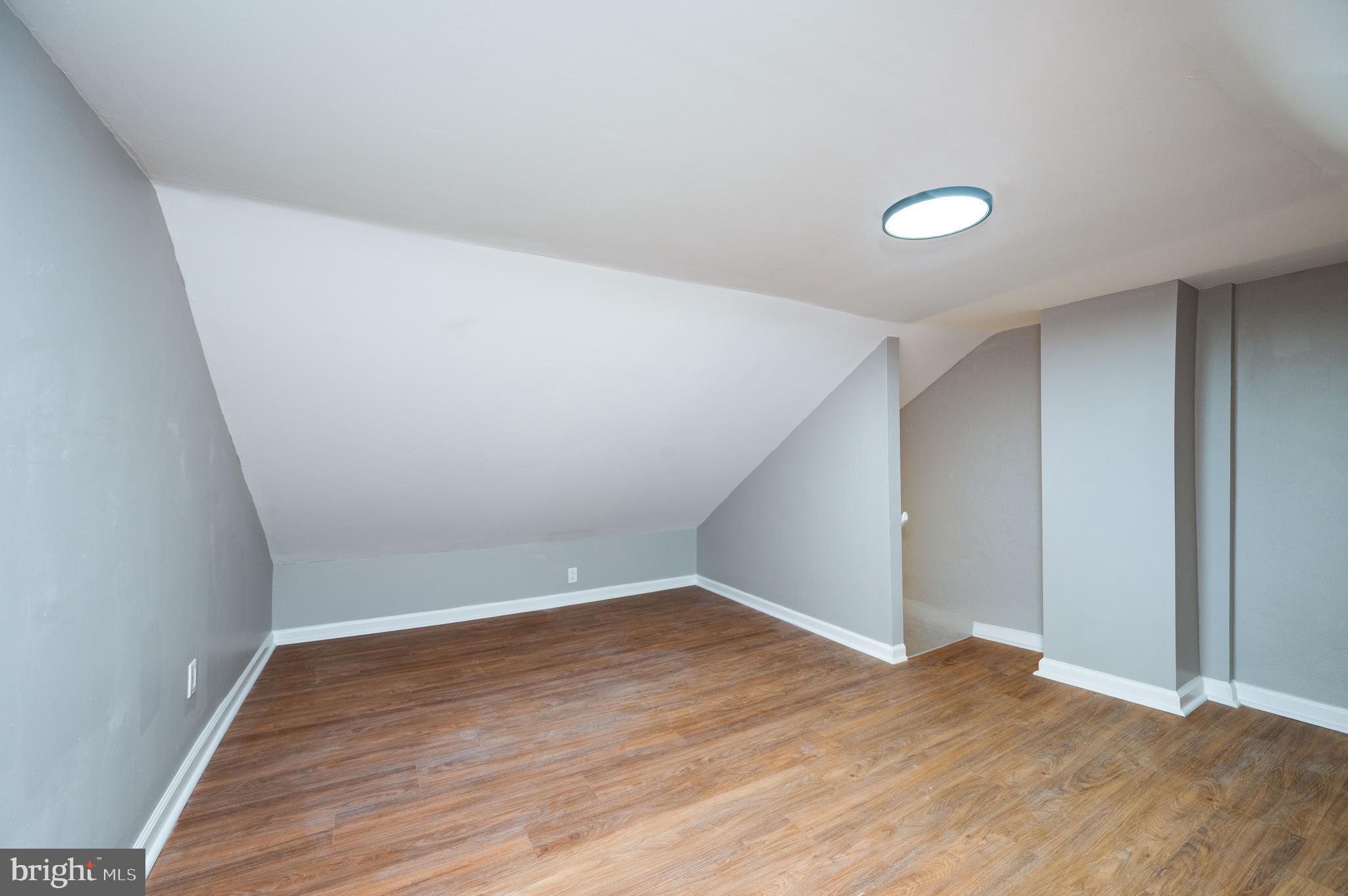620 Minor Street Reading, PA 19602 - Photo 33 of 36 wooden floor in an empty room