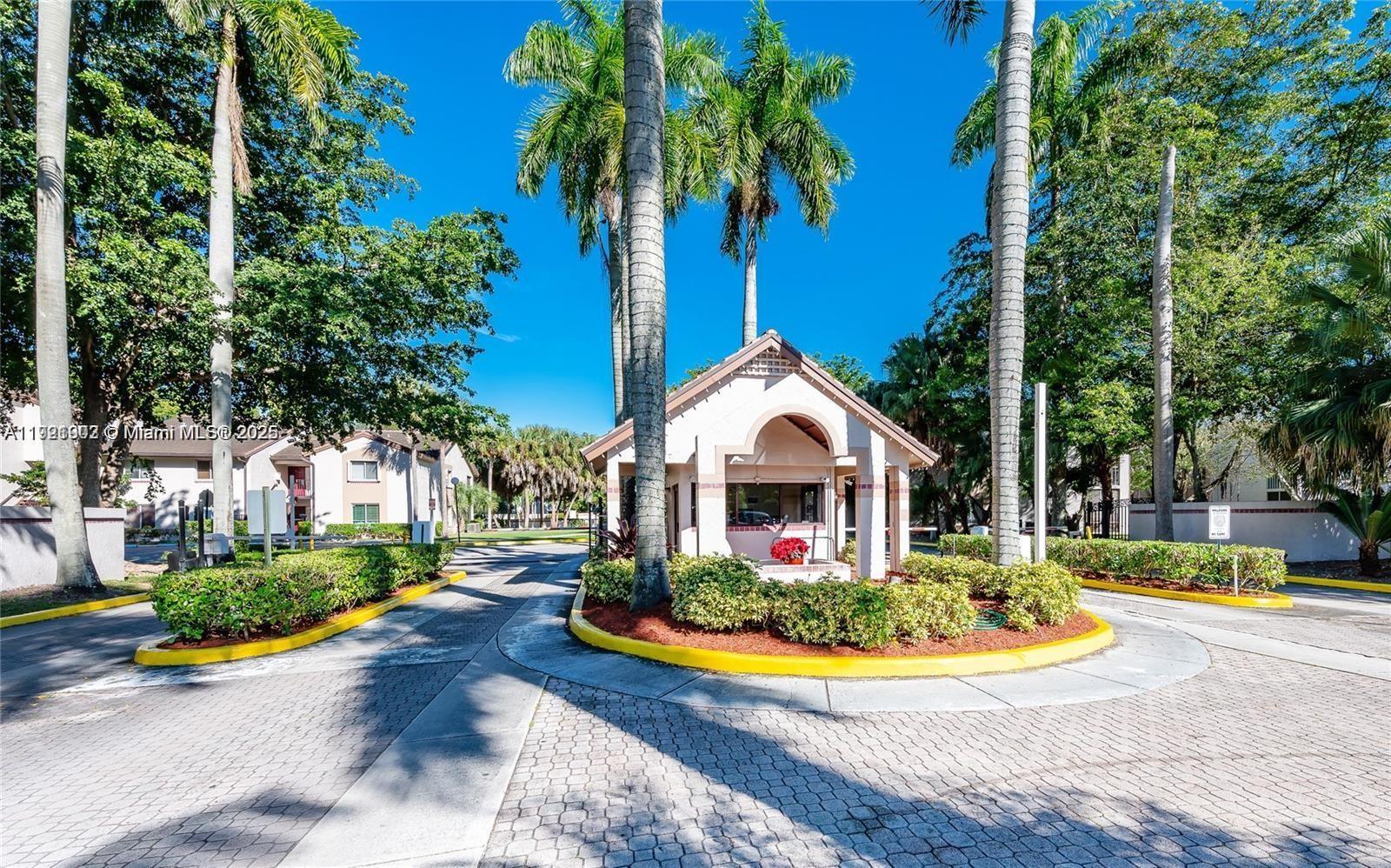 9446 Southwest 140th Court, Unit 9446 Miami, FL 33186 - Photo 1 of 48 a view of outdoor space yard and swimming pool
