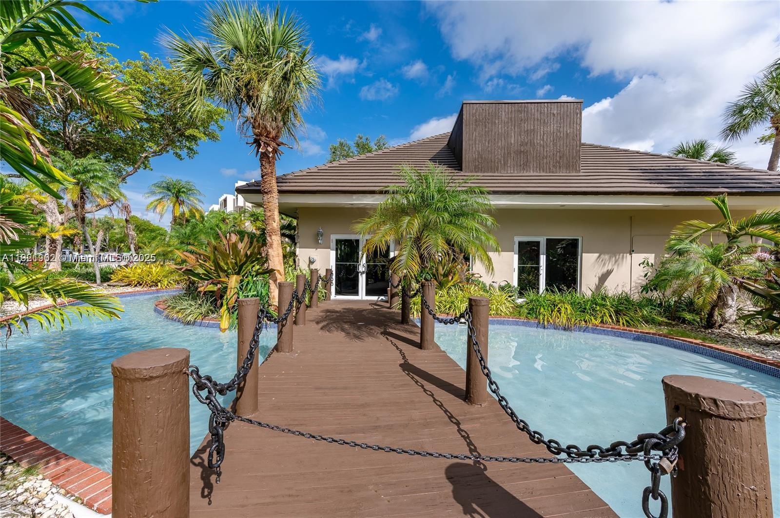 9446 Southwest 140th Court, Unit 9446 Miami, FL 33186 - Photo 14 of 48 a view of a house with patio