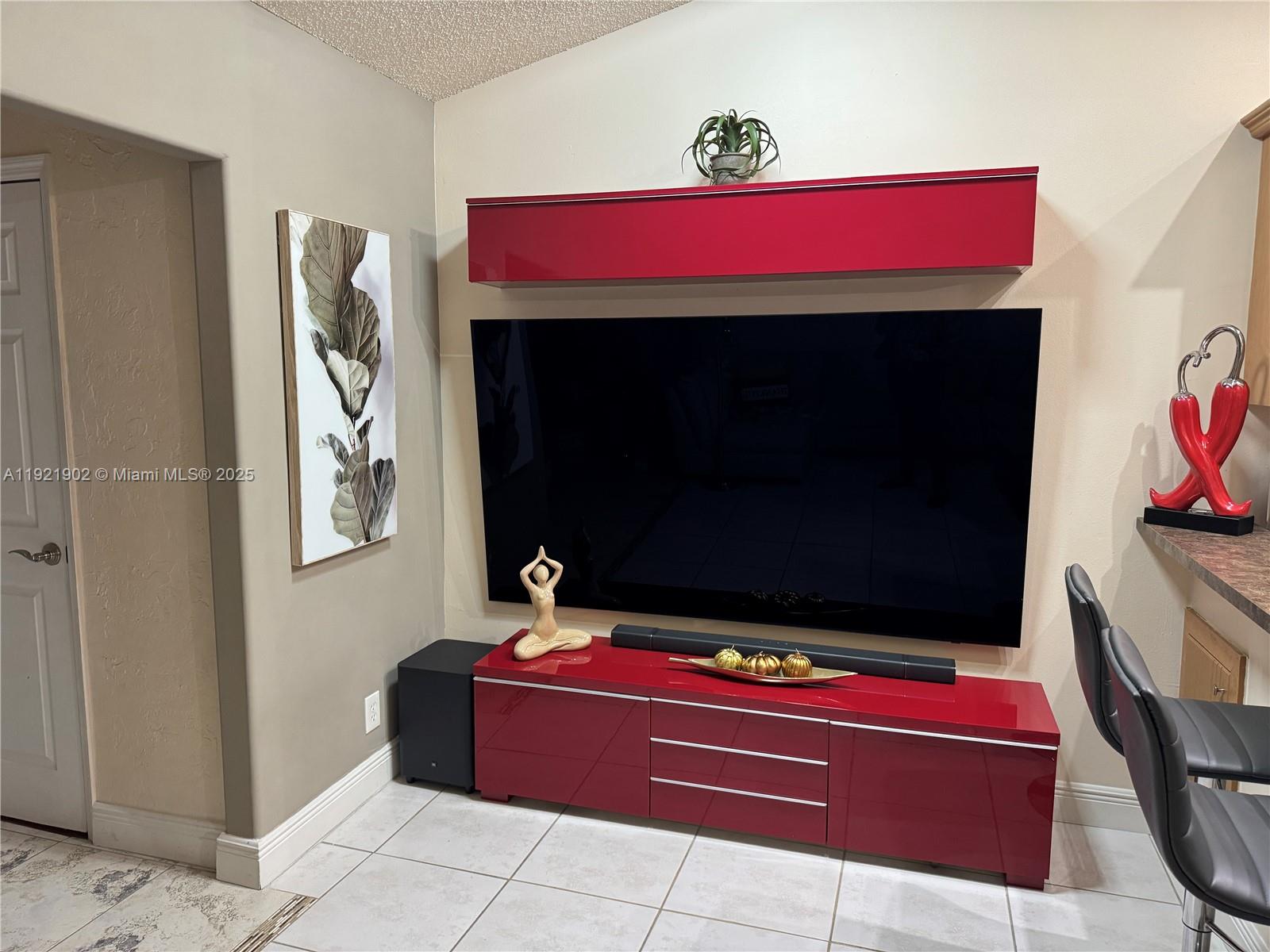 9446 Southwest 140th Court, Unit 9446 Miami, FL 33186 - Photo 24 of 48 a living room with furniture