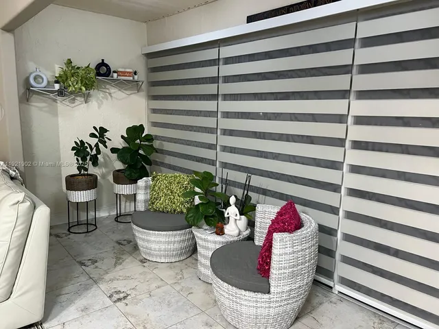 an aerial view of a house with a yard lake and lake view