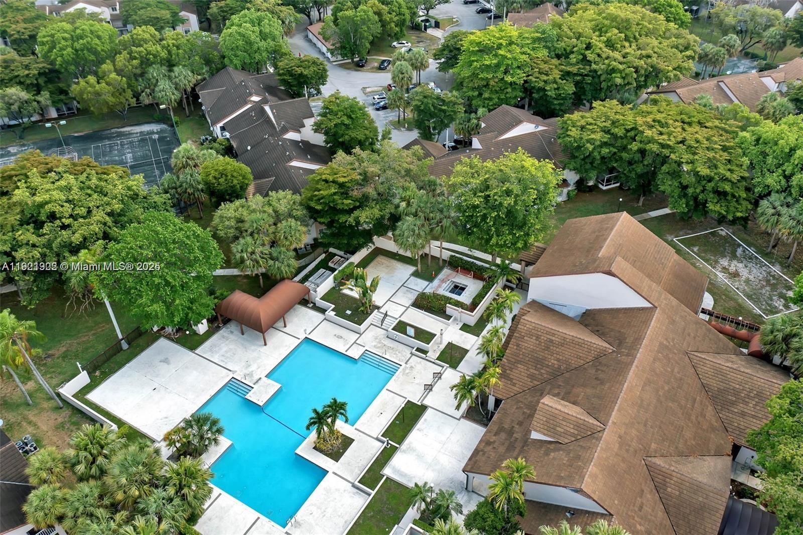 9446 Southwest 140th Court, Unit 9446 Miami, FL 33186 - Photo 46 of 48 an aerial view of a house with outdoor space