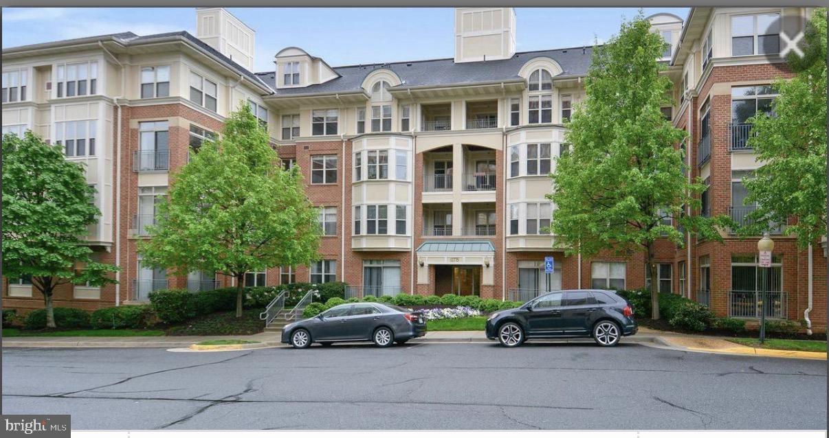 1855 Stratford Park Place, Unit 214 Reston, VA 20190 - Photo 1 of 29 a building view
