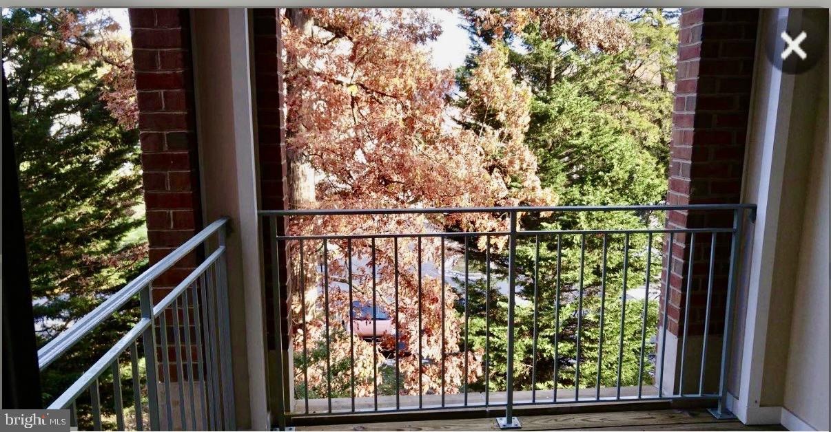 1855 Stratford Park Place, Unit 214 Reston, VA 20190 - Photo 18 of 29 a view of a garden from a window