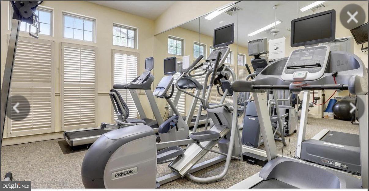 1855 Stratford Park Place, Unit 214 Reston, VA 20190 - Photo 22 of 29 a view of a room with gym equipment