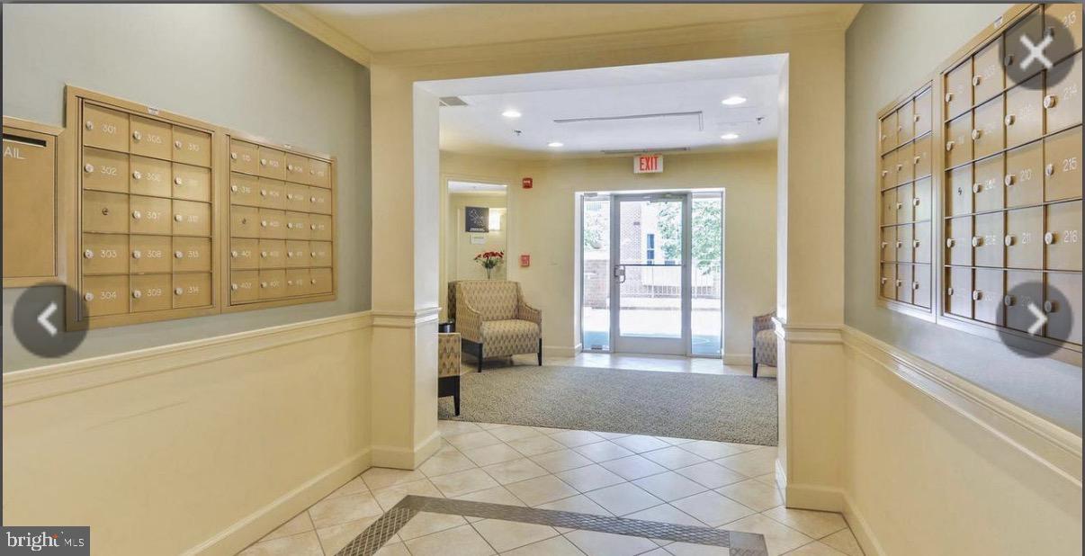 1855 Stratford Park Place, Unit 214 Reston, VA 20190 - Photo 26 of 29 a spacious bathroom with a tub and shower