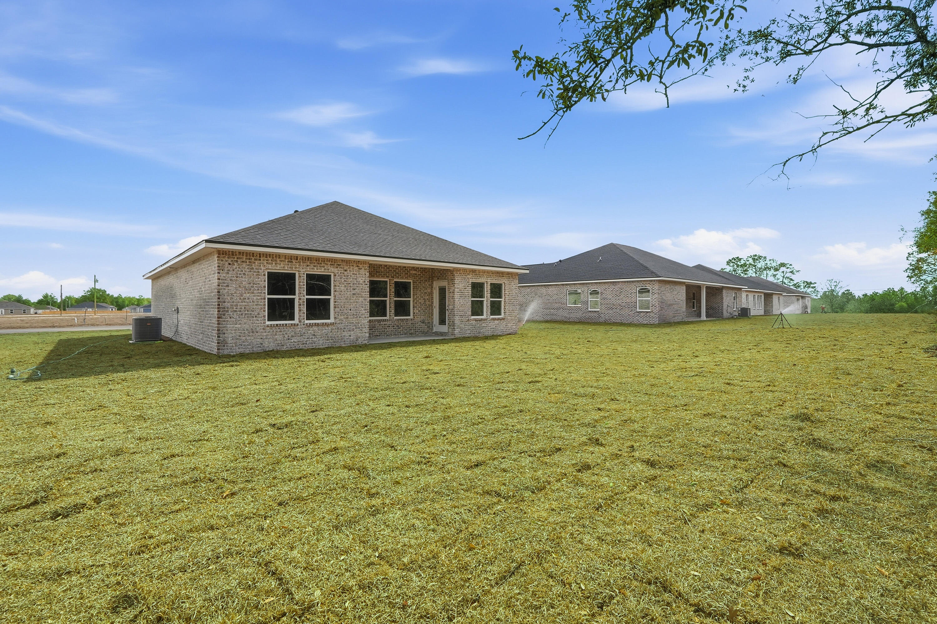 6108 Mildred's Way Crestview, FL 32539 - Photo 25 of 27 a view of a house with a yard