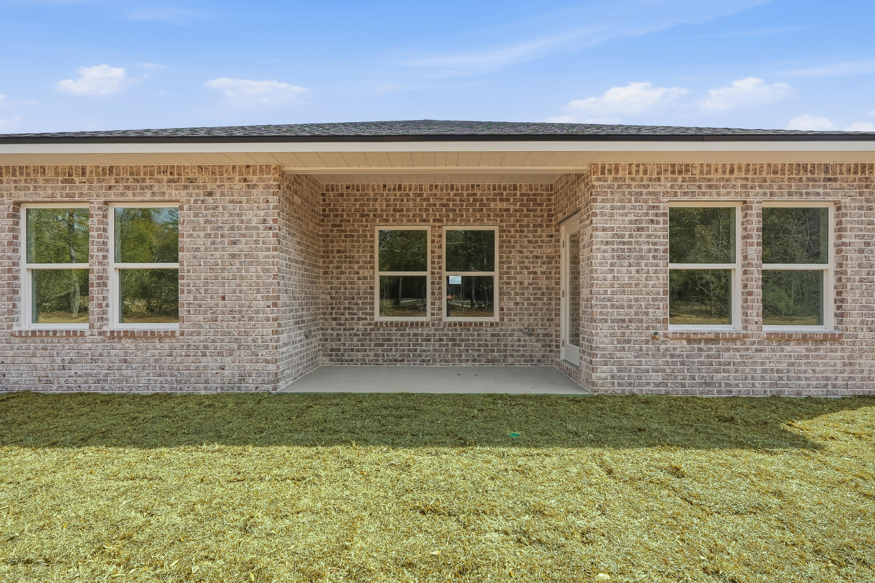 6108 Mildred's Way Crestview, FL 32539 - Photo 27 of 27 a view of front door of house with a yard