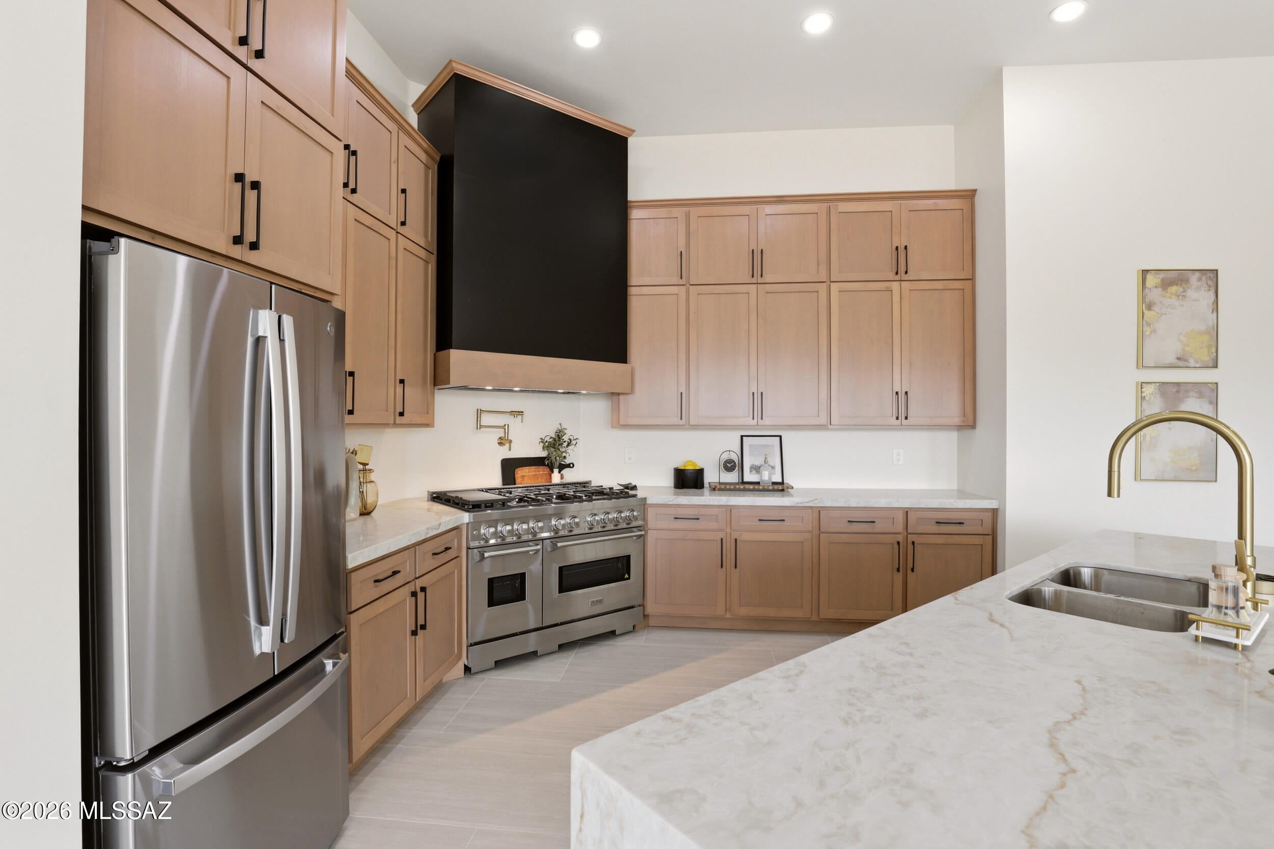 14527 East Sands Ranch Road Vail, AZ 85641 - Photo 9 of 48 a kitchen with cabinets stainless steel appliances and sink