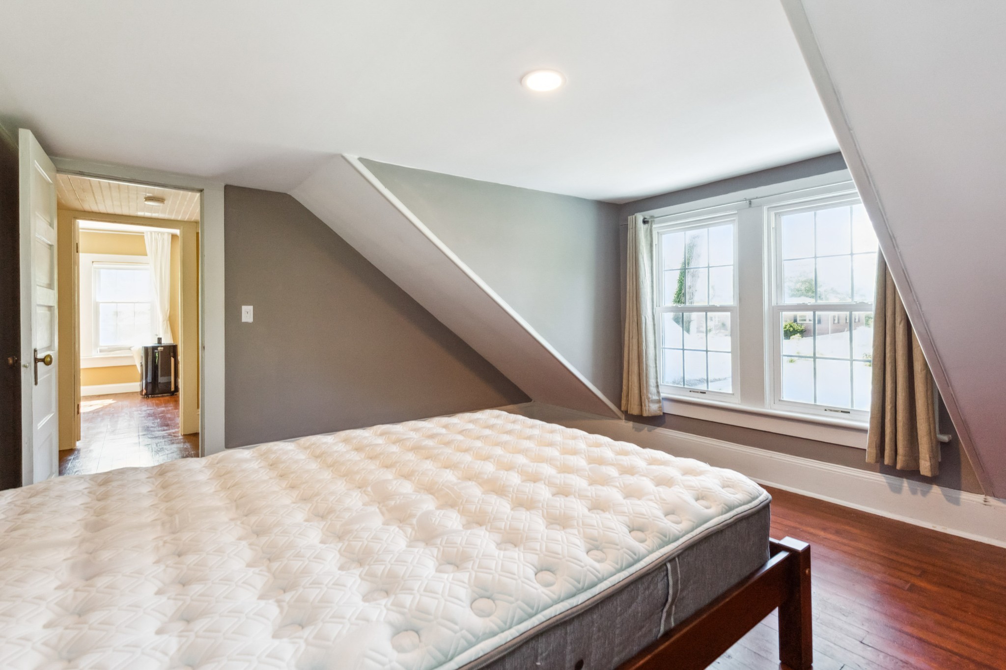 831 3rd Street Tracy City, TN 37387 - Photo 16 of 25 a bedroom with a bed and a large window