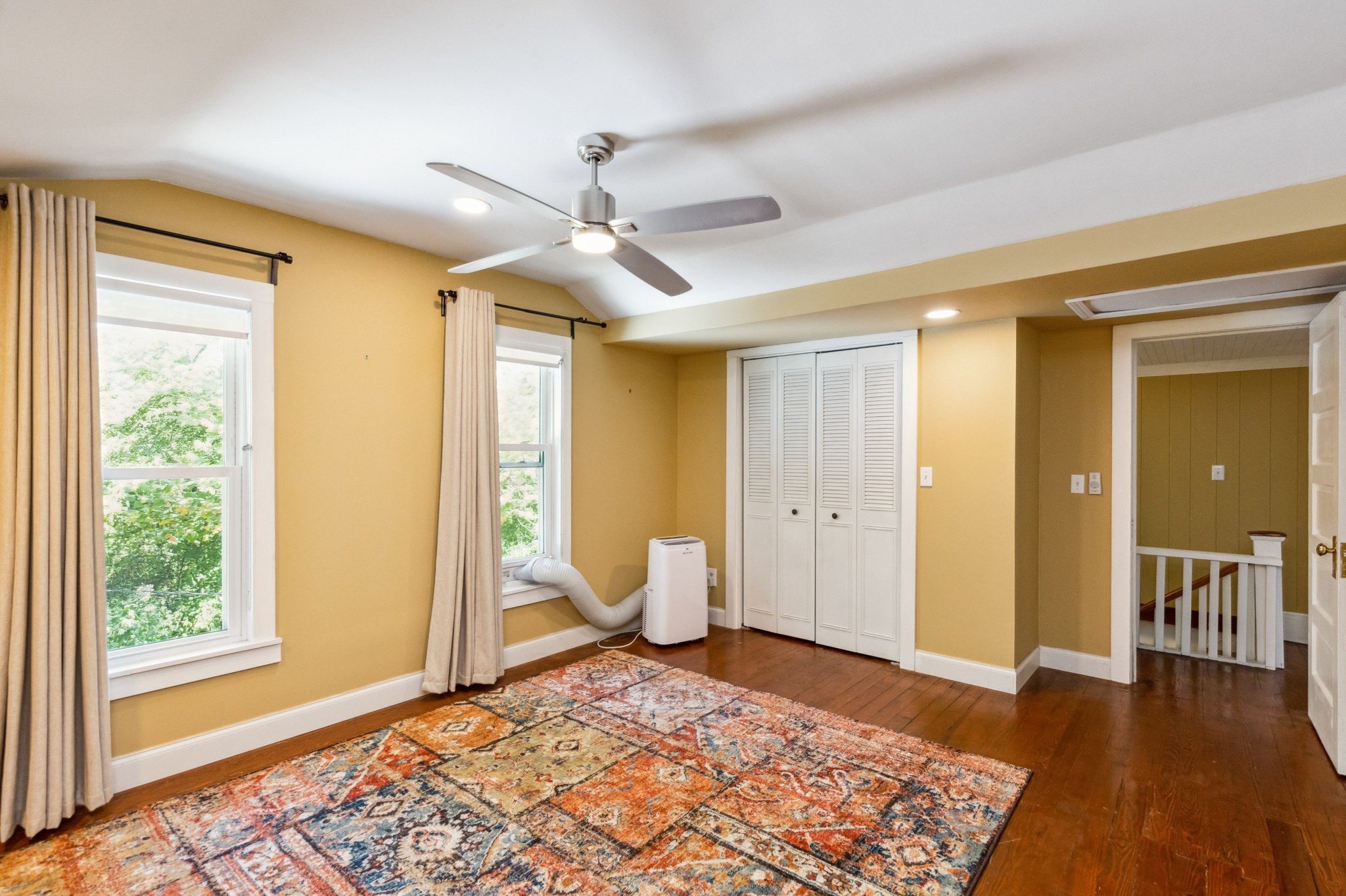 831 3rd Street Tracy City, TN 37387 - Photo 18 of 25 a very nice looking room with a large window and wooden floor