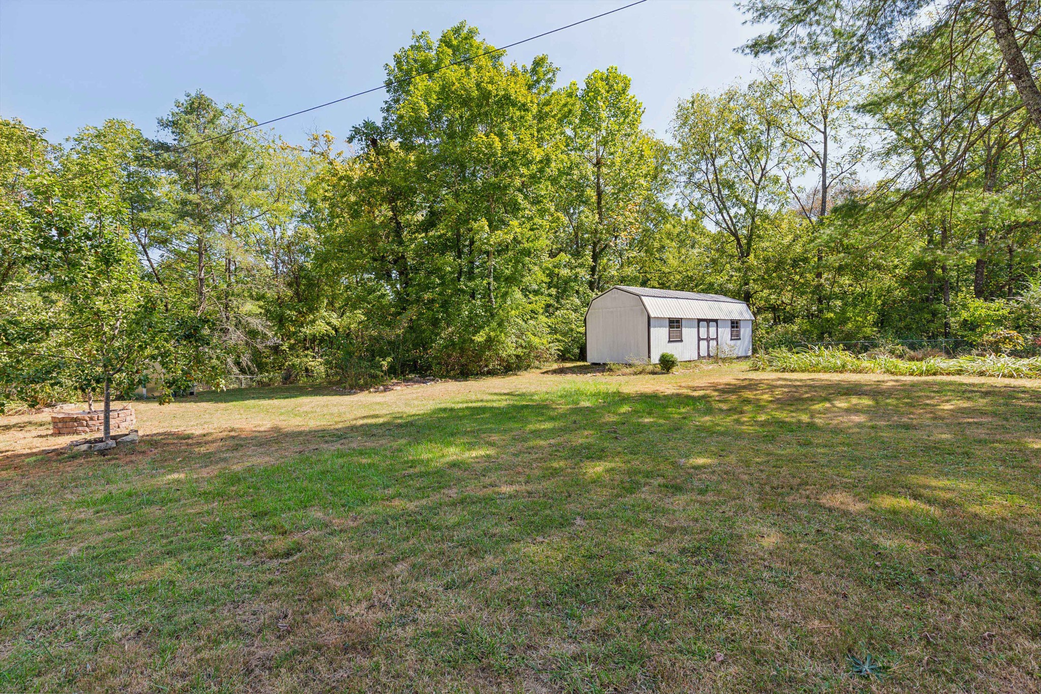 831 3rd Street Tracy City, TN 37387 - Photo 25 of 25 a fire hydrant in the middle of a field