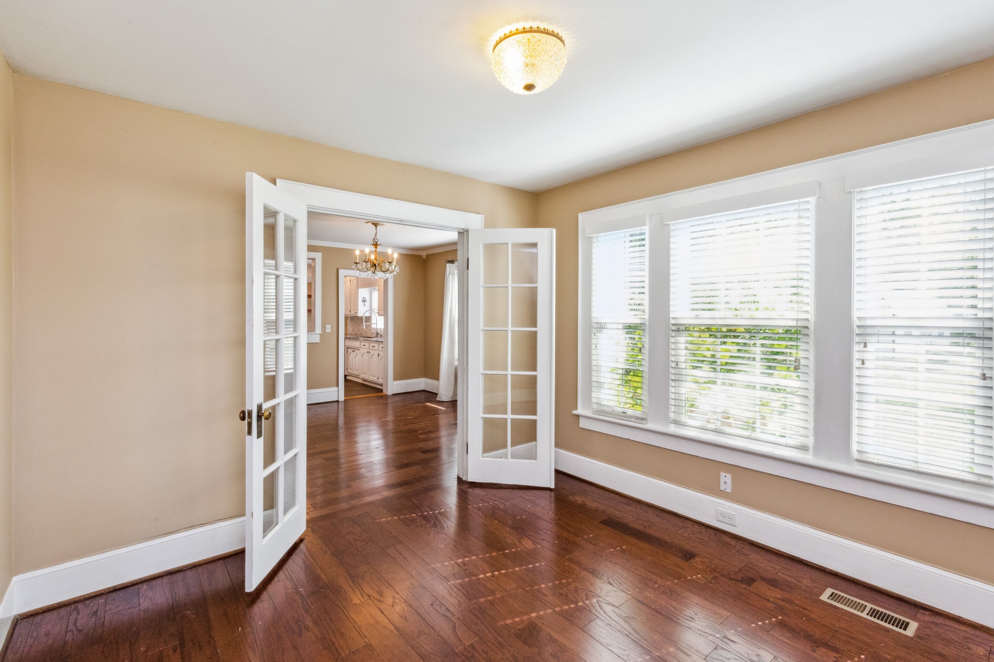 831 3rd Street Tracy City, TN 37387 - Photo 4 of 25 a view of livingroom with hardwood floor and window