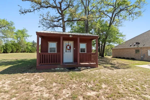 a view of backyard of house