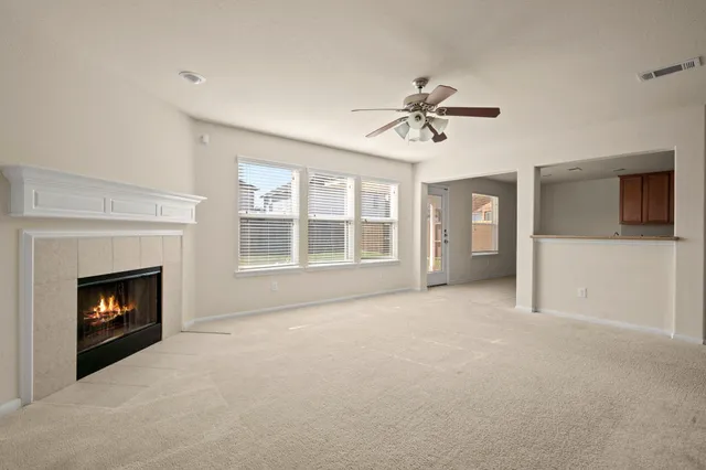a view of a kitchen with a sink cabinets and a window
