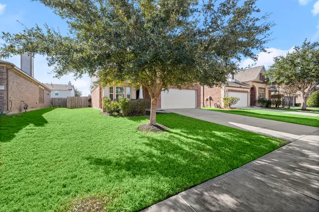 a house view with garden space