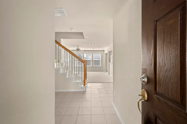 a view of a hallway with entryway