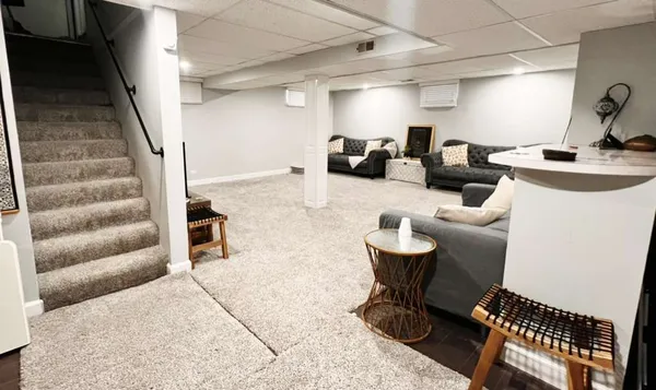 a view of a livingroom with furniture and a couch