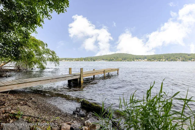 a view of a lake from a yard
