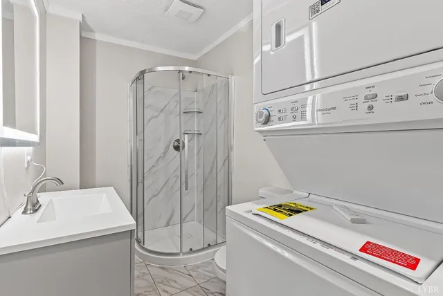 a bathroom with a sink and a shower