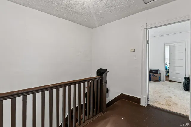 a view of hallway with livingroom