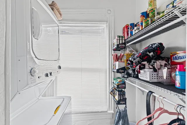 a bathroom with a sink a mirror and shower